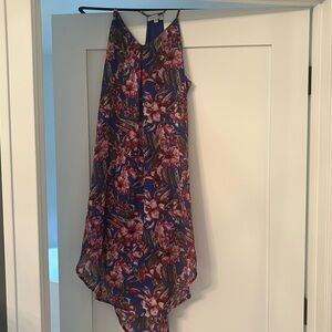 Beautiful floral sundress. Hits about calf length or lower depending on height.